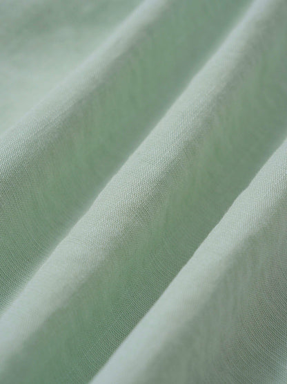 Robe longue de plage dos nu découpe vert clair