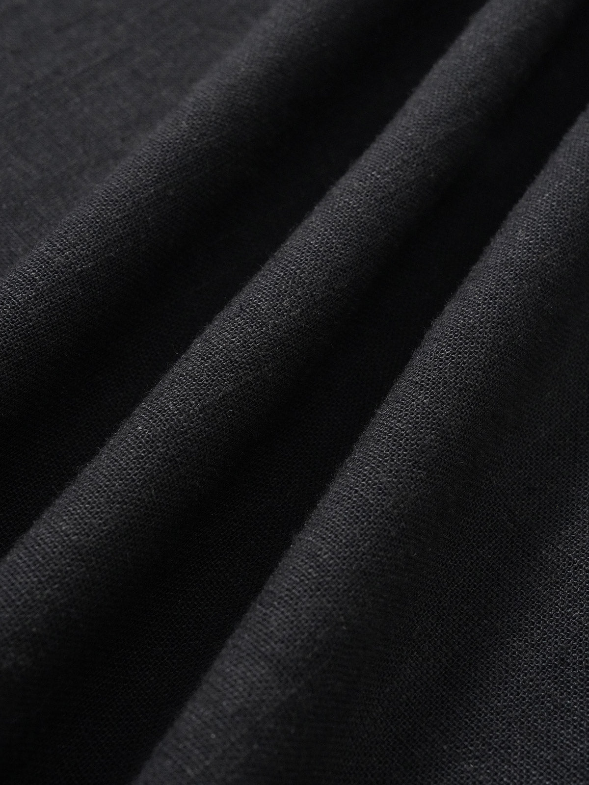 Robe de plage plissée noire à col en V