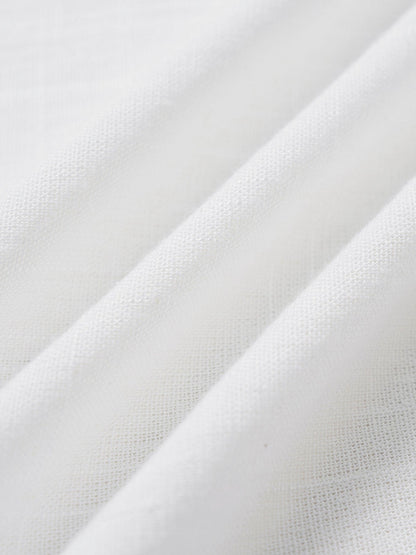 Robe de plage blanche à col en V